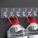 PORTE MANTEAU ADHESIF 6 POSITIONS COULEUR TRANSPARENT / OR