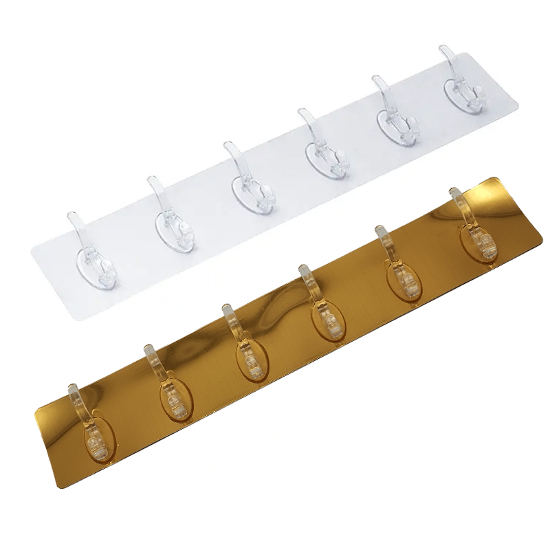 PORTE MANTEAU ADHESIF 6 POSITIONS COULEUR TRANSPARENT / OR