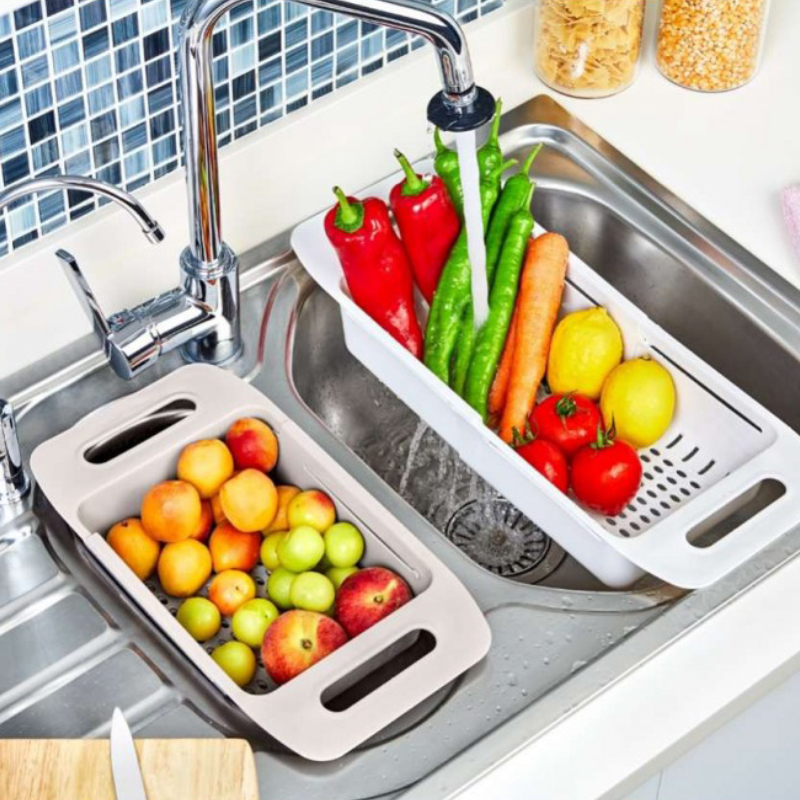 ADJUSTABLE DRAINER